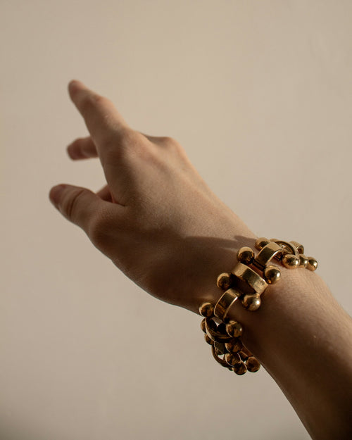 Chunky chain bracelet worn on the wrist