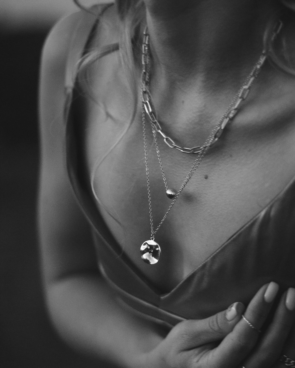 Heart pendant necklace worn on the neck