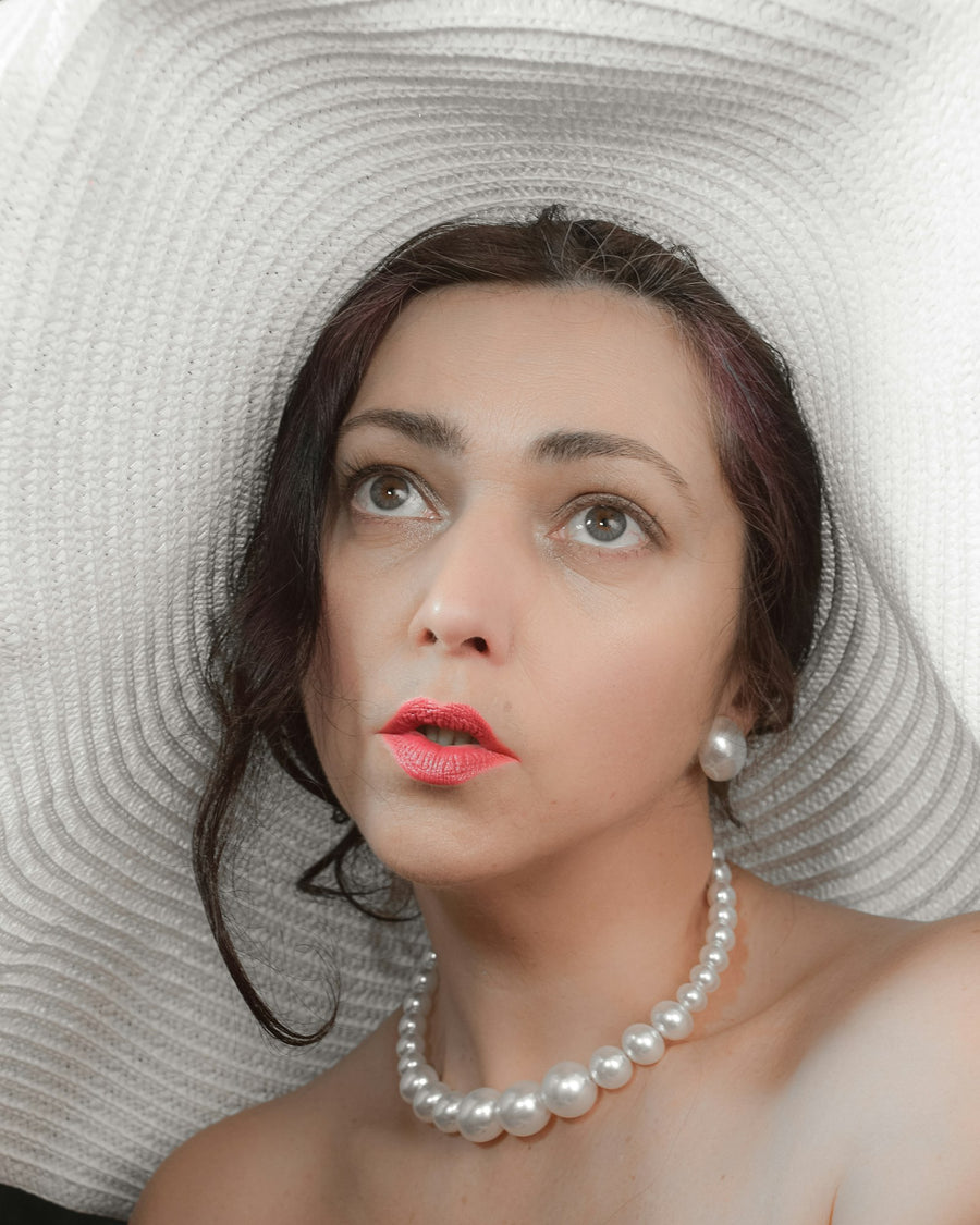 Woman wearing a pearl choker