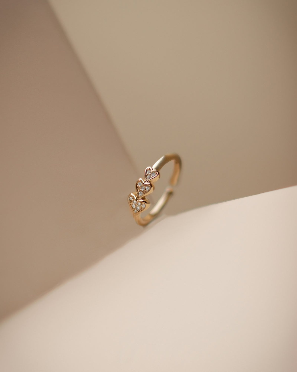 Solitaire ring on a white surface