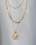 Halo drop pendant on a fine chain