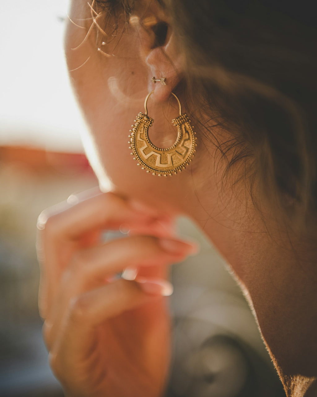Stud earring worn on the ear