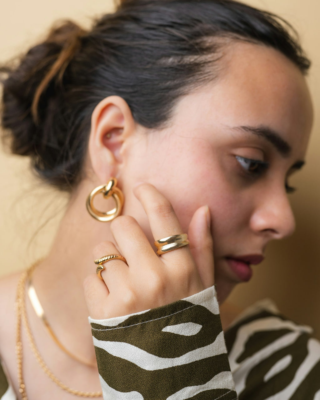 Woman wearing gold rings