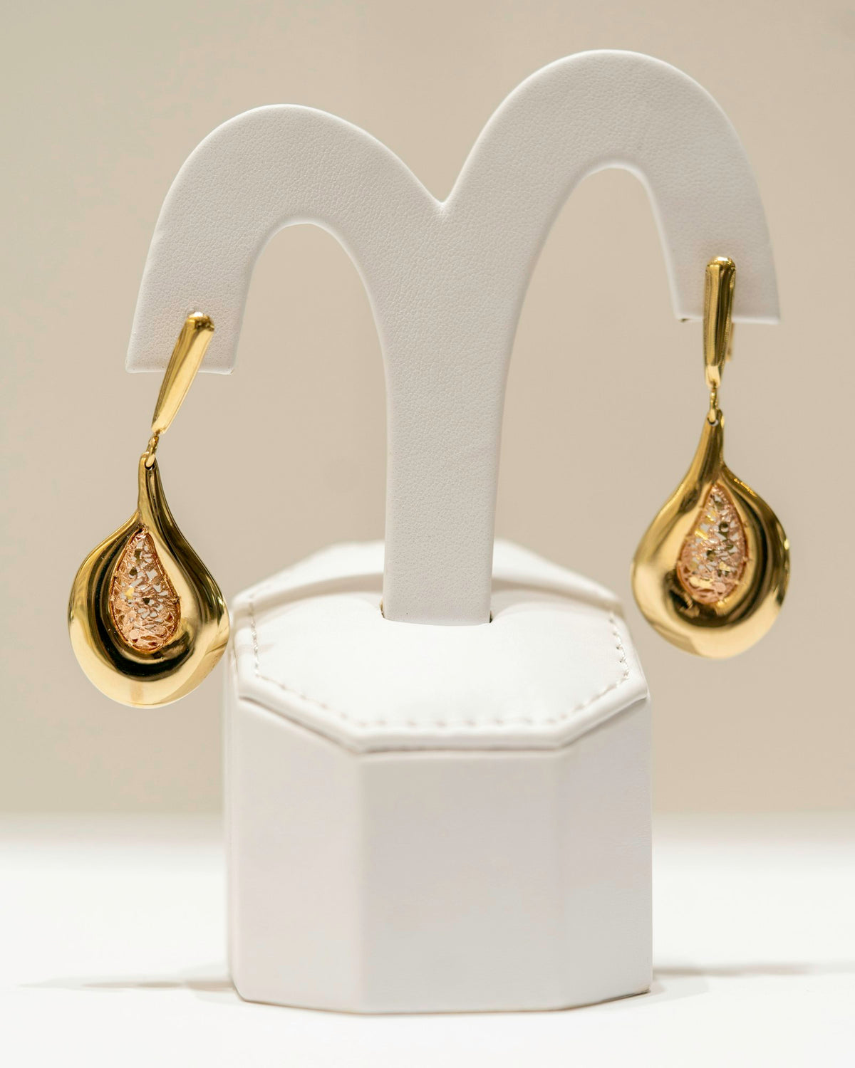Gold and diamond stud earrings