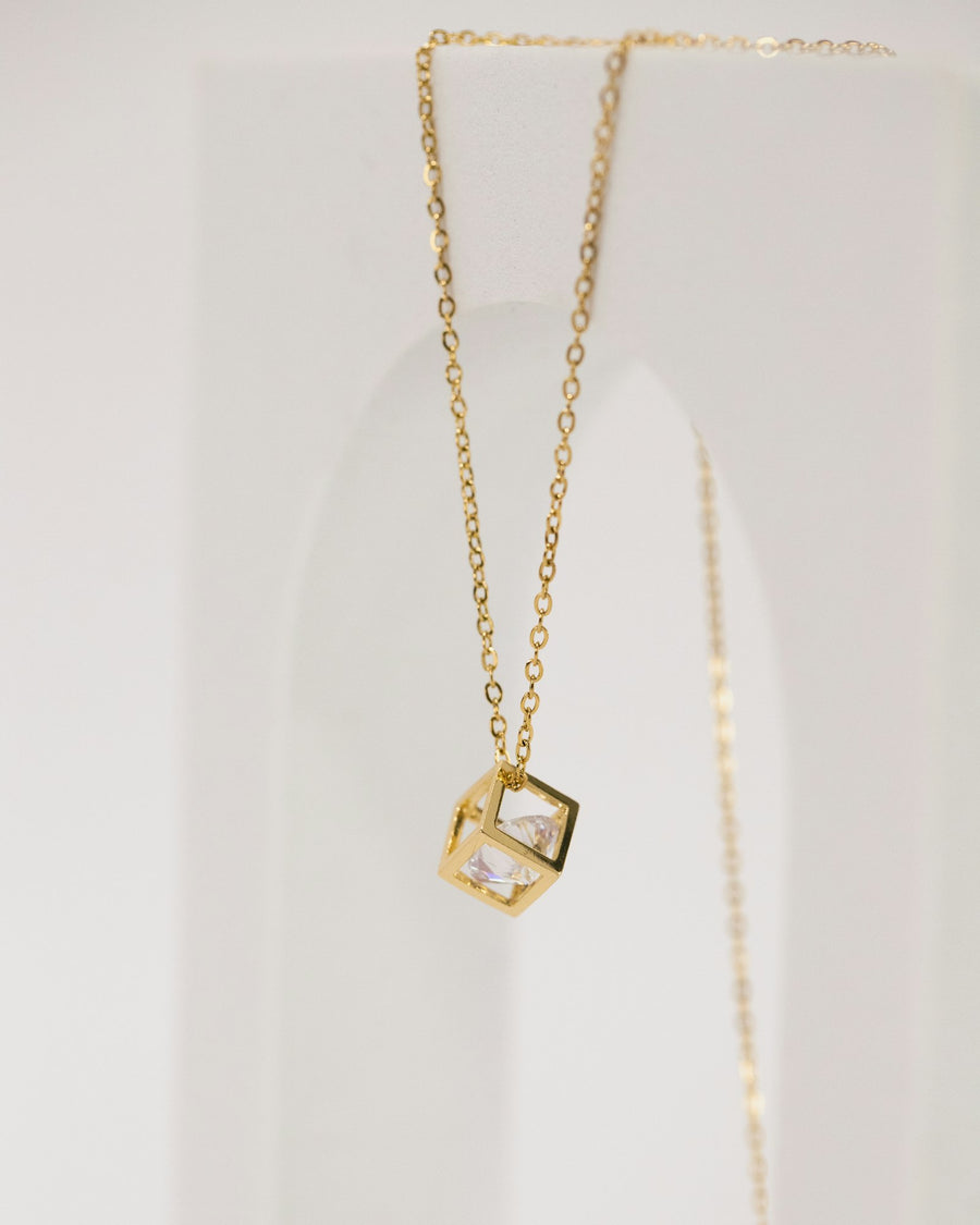 Gold necklace with a square pendant