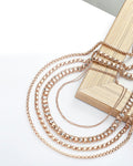 Fine chain bracelets arranged together