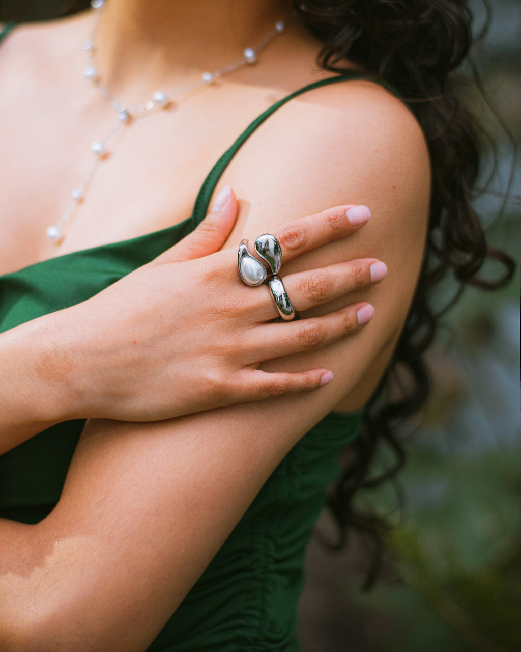 Silver dome ring worn on the hand